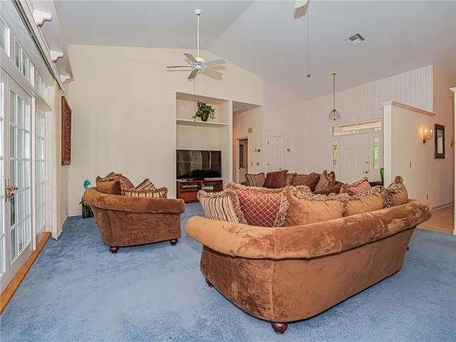 a living room with furniture and a couch