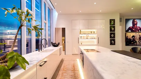 a swimming pool with a large window