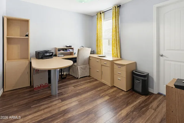 a view of a kitchen with a sink and a window