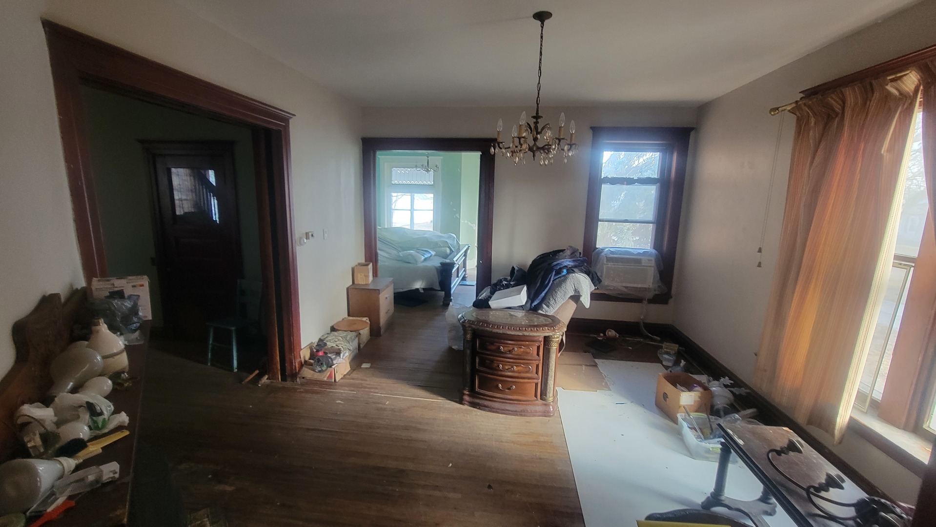 505 Paddock Avenue Ashton, IL 61006 - Photo 11 of 31 a living room with furniture and a chandelier