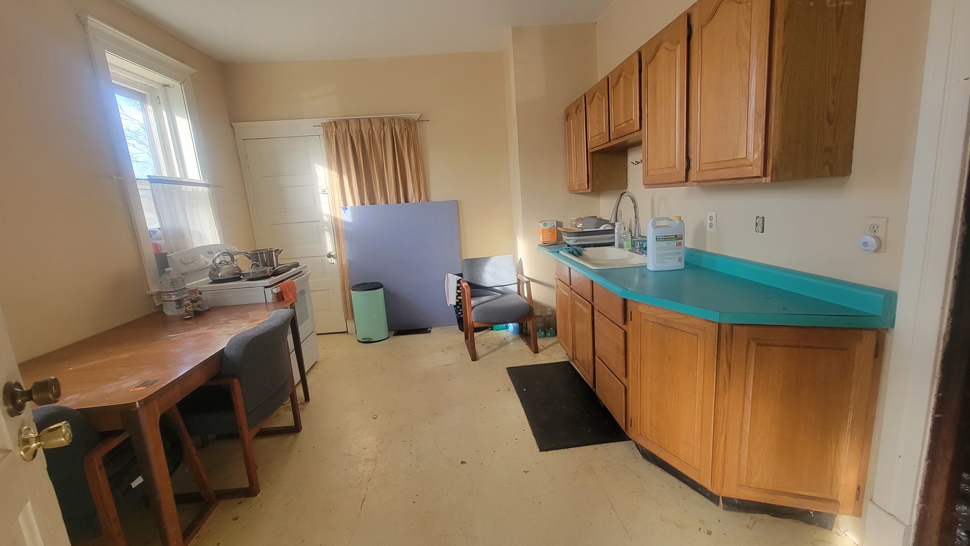 505 Paddock Avenue Ashton, IL 61006 - Photo 9 of 31 a view of a kitchen with sink and microwave