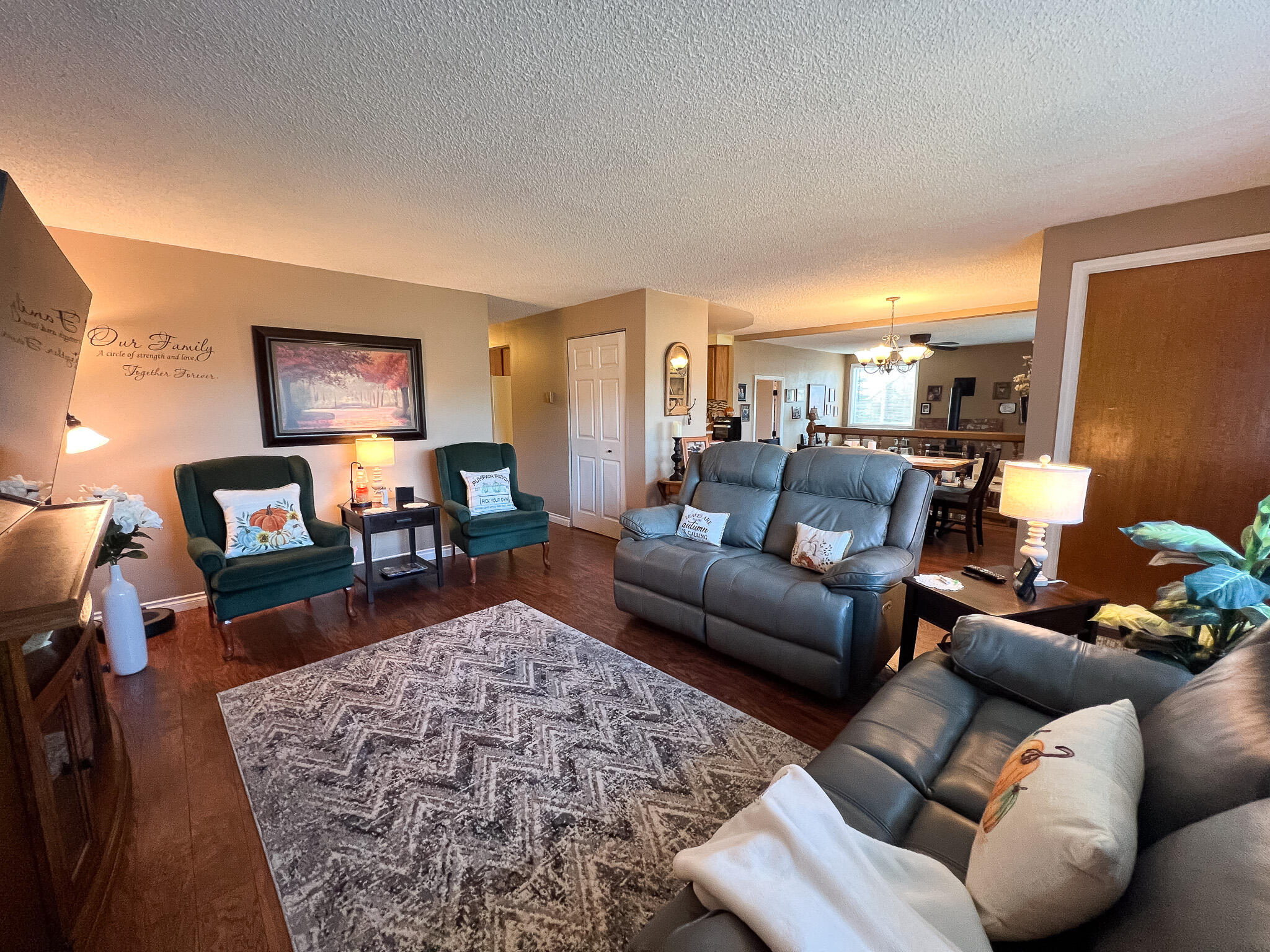 1225 East B Street Fossil, OR 97830 - Photo 5 of 33 a living room with furniture and a rug