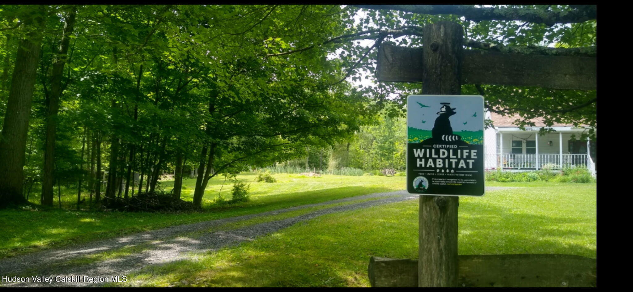 457 Hervey Street Road Cornwallville, NY 12418 - Photo 46 of 61 a sign that is sitting in the grass next to a yard