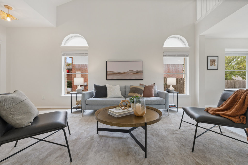 1305 Tudor House Road Pflugerville, TX 78660 - Photo 2 of 40 The main living space offers flexibility and scale, designed to adapt beautifully to a variety of lifestyles and furniture layouts.