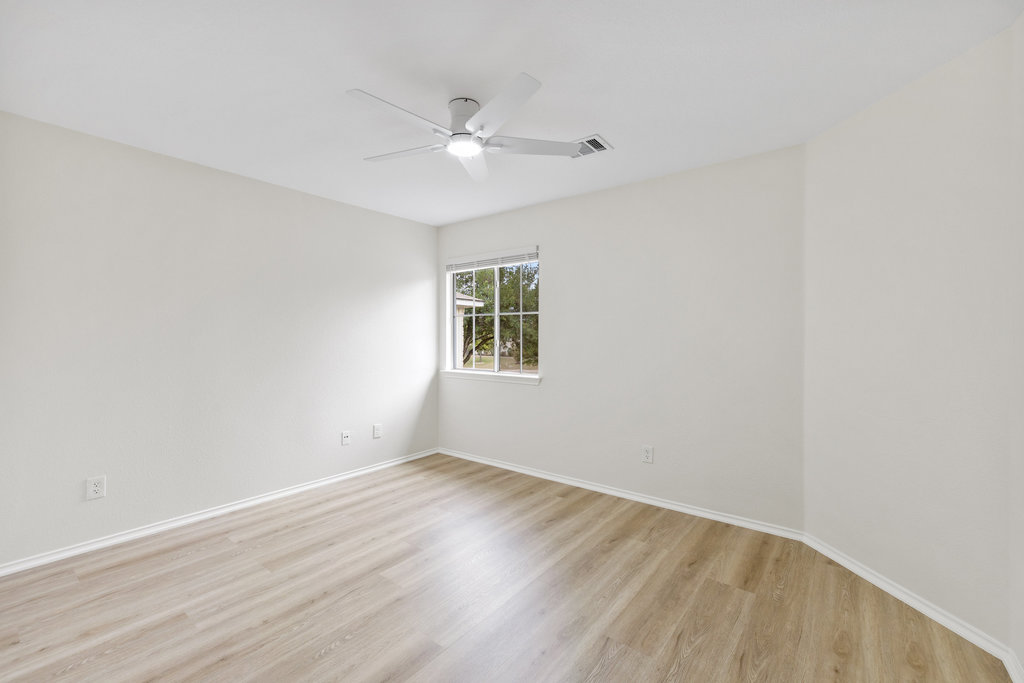 1305 Tudor House Road Pflugerville, TX 78660 - Photo 29 of 40 Secondary bedrooms are well proportioned, light filled, and ready to fit a variety of lifestyles.