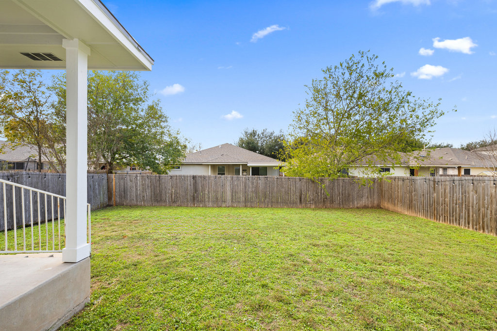 1305 Tudor House Road Pflugerville, TX 78660 - Photo 37 of 40 This outdoor area feels calm and welcoming, offering flexibility for everything from lounging to hosting friends.