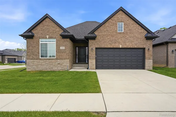 $425,000 | 15365 Eton Pointe Drive, Clinton Township, MI 48035
