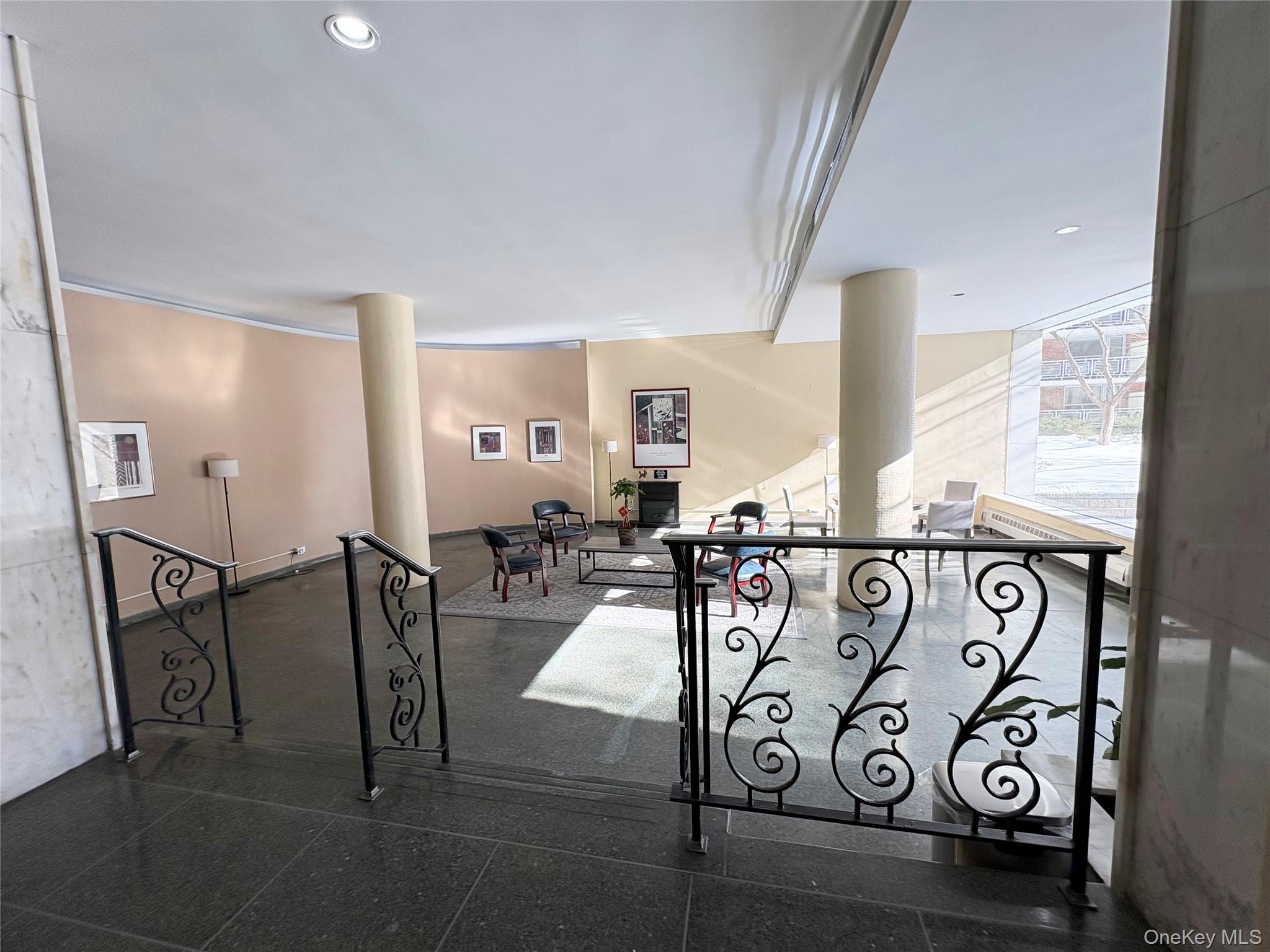 61-15 97th Street, Unit LC Queens, NY 11374 - Photo 22 of 27 a view of a room with furniture and window