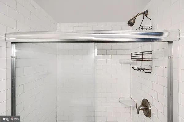 a close view of a shower in the bathroom
