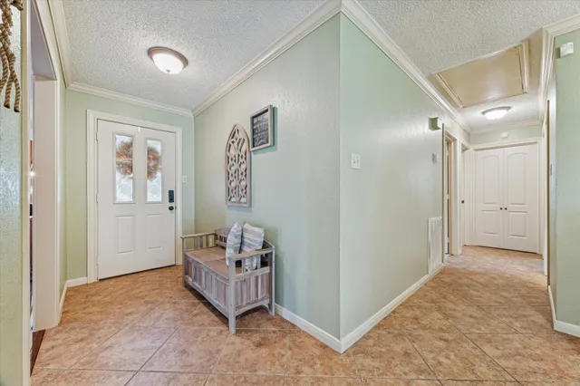 a living room with furniture fireplace and flat screen tv
