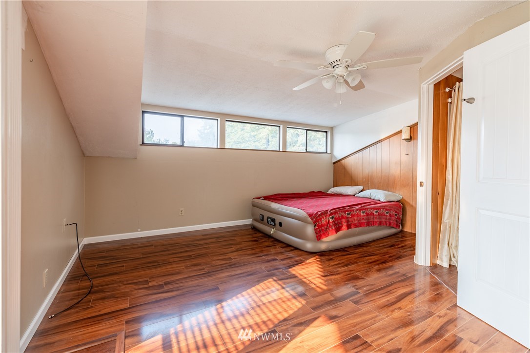 3826 Sapp Road Southwest Olympia, WA 98512 - Photo 20 of 39 a bedroom with a bed and closet