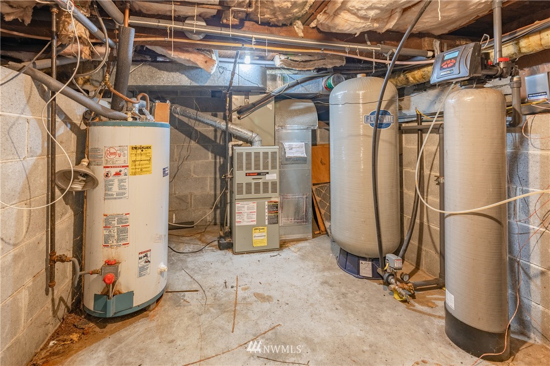 3826 Sapp Road Southwest Olympia, WA 98512 - Photo 28 of 39 a view of a room with water heater and storage