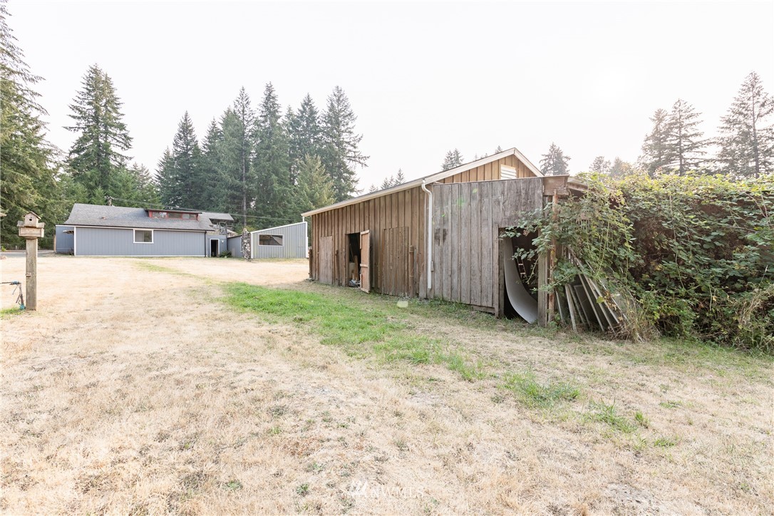3826 Sapp Road Southwest Olympia, WA 98512 - Photo 5 of 39 a house view with a backyard space