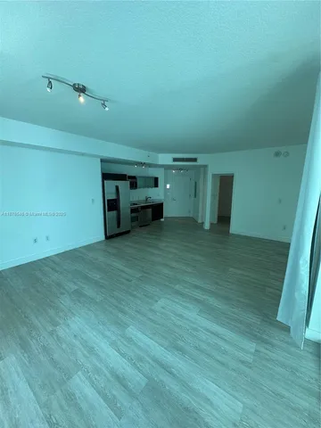 a view of a room with an empty space