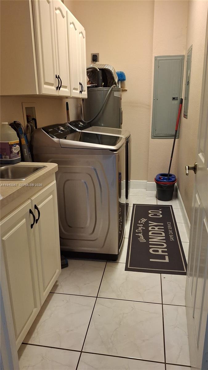 1034 Bayberry Loop Clewiston, FL 33440 - Photo 29 of 38 a kitchen with a stove and a cabinets