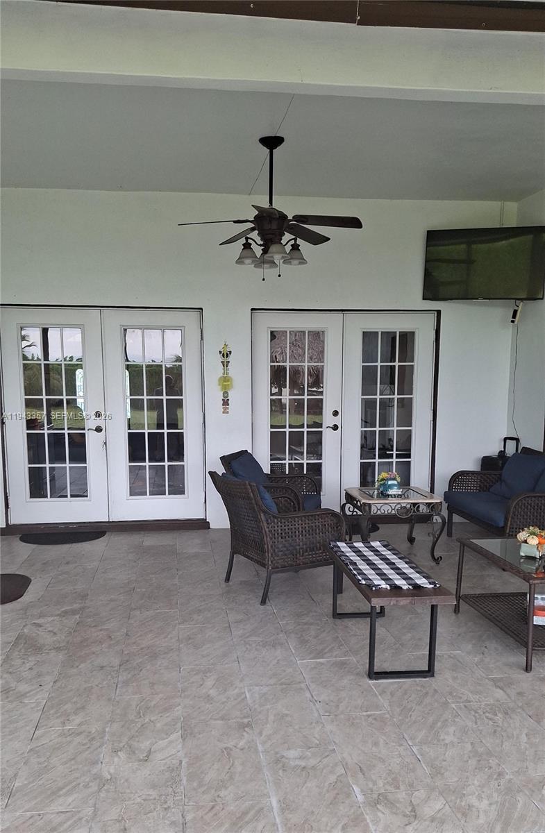 1034 Bayberry Loop Clewiston, FL 33440 - Photo 30 of 38 a living room with furniture and a window