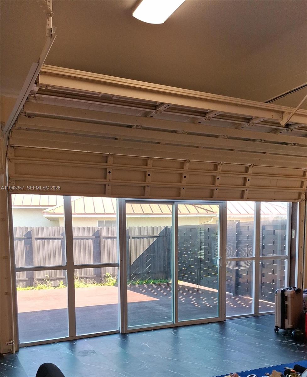 1034 Bayberry Loop Clewiston, FL 33440 - Photo 31 of 38 a view of empty room with wooden floor and fan