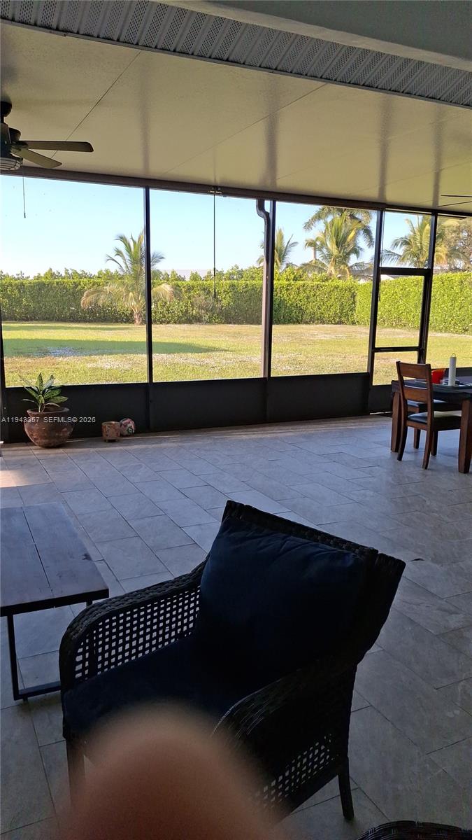 1034 Bayberry Loop Clewiston, FL 33440 - Photo 32 of 38 a view of a floor to ceiling window with an outdoor view