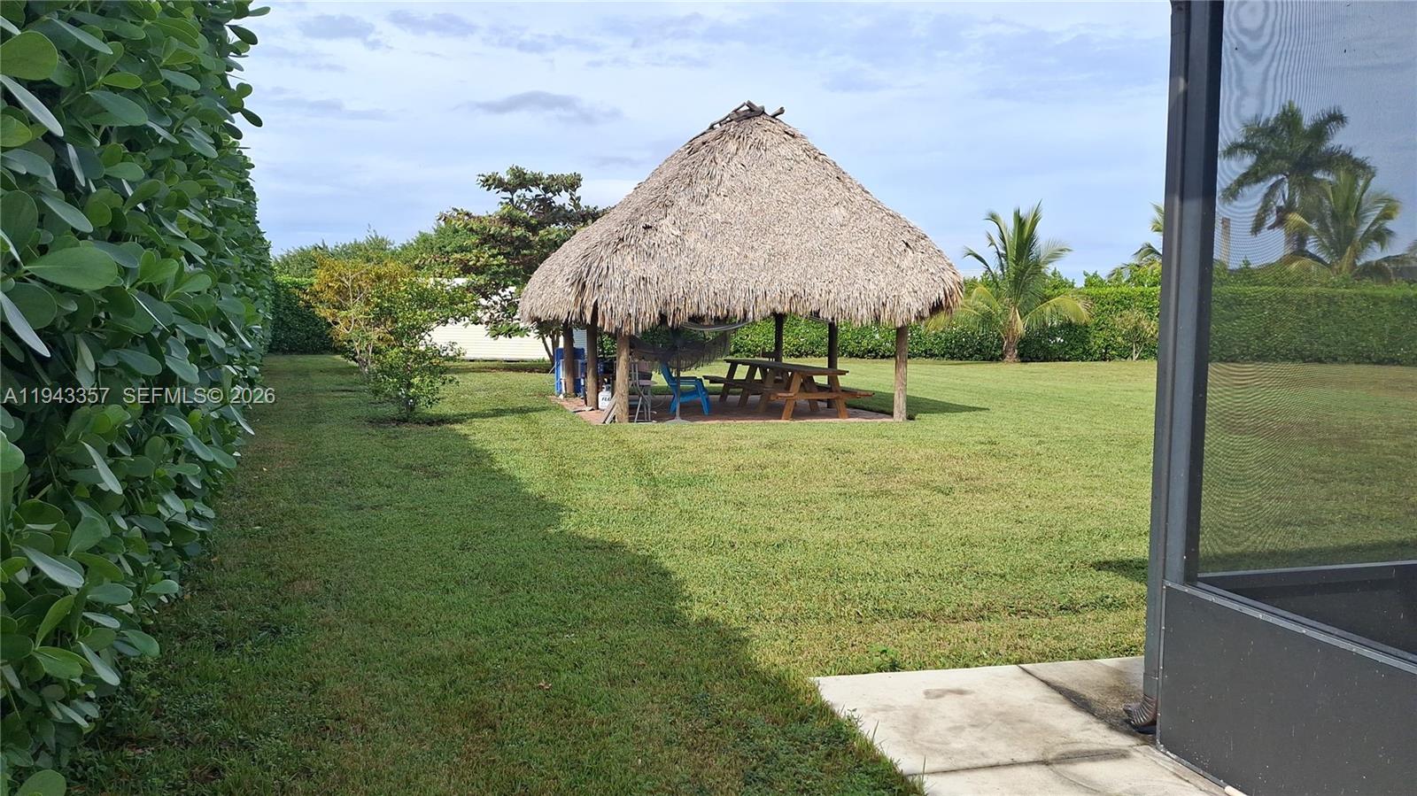 1034 Bayberry Loop Clewiston, FL 33440 - Photo 36 of 38 a view of a garden
