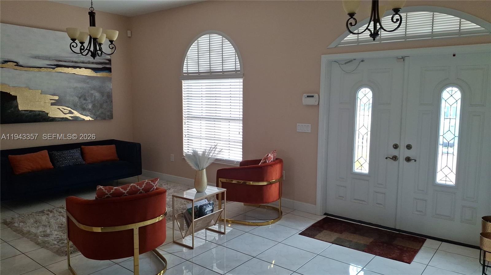 1034 Bayberry Loop Clewiston, FL 33440 - Photo 4 of 38 a living room with furniture and a window