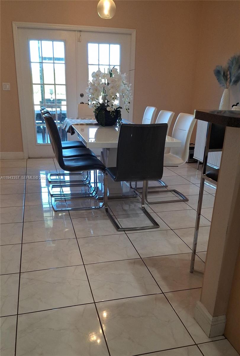 1034 Bayberry Loop Clewiston, FL 33440 - Photo 5 of 38 a view of a dining room with furniture