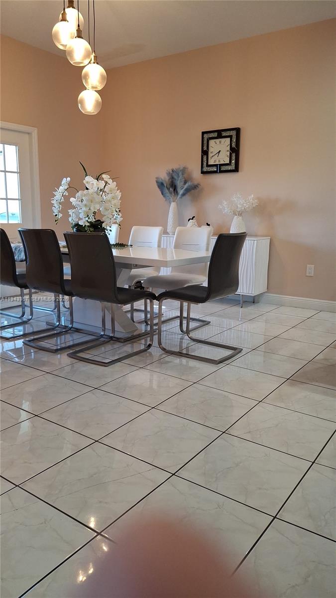 1034 Bayberry Loop Clewiston, FL 33440 - Photo 6 of 38 a living room with furniture