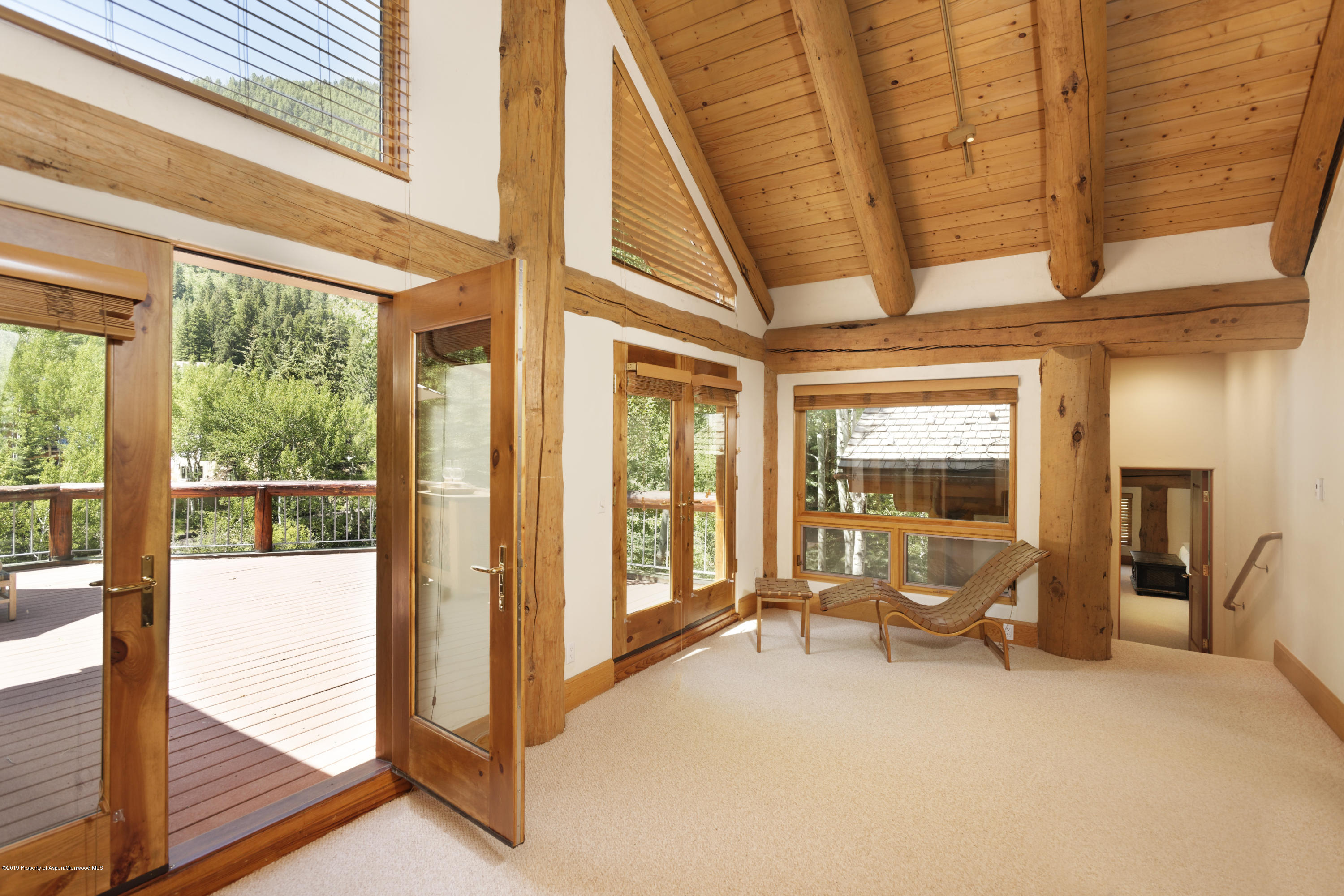 1417 Crystal Lake Road Aspen, CO 81611 - Photo 20 of 36 a view of a room with a large window
