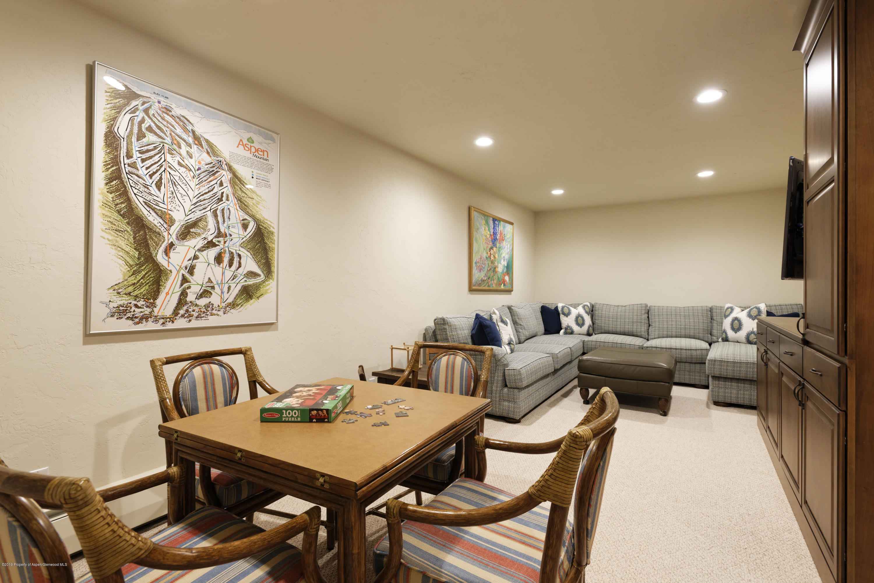 1417 Crystal Lake Road Aspen, CO 81611 - Photo 31 of 36 a living room with furniture and a wooden floor