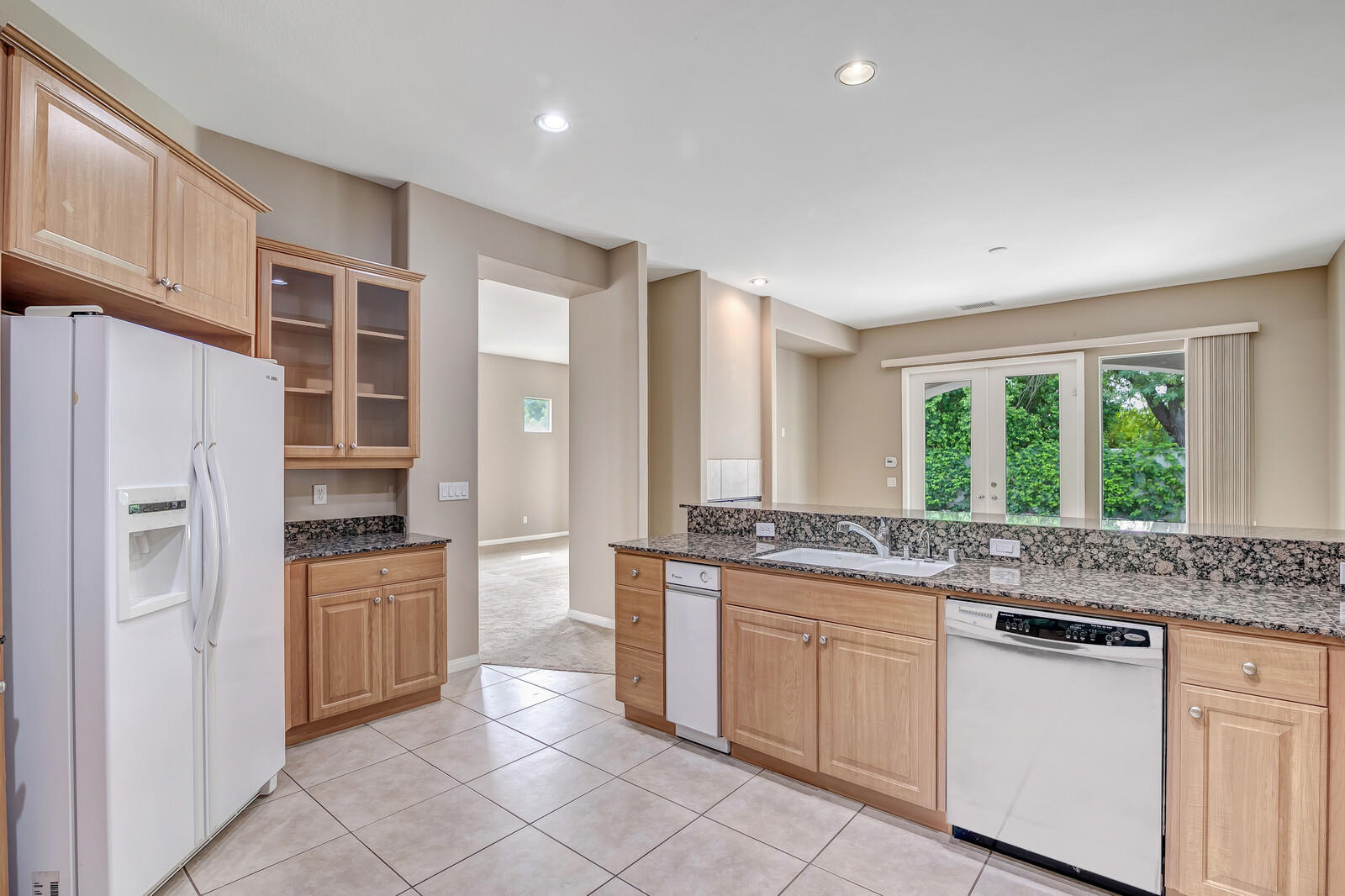 17 Provence Way Rancho Mirage, CA 92270 - Photo 9 of 30 Kitchen open to the family room