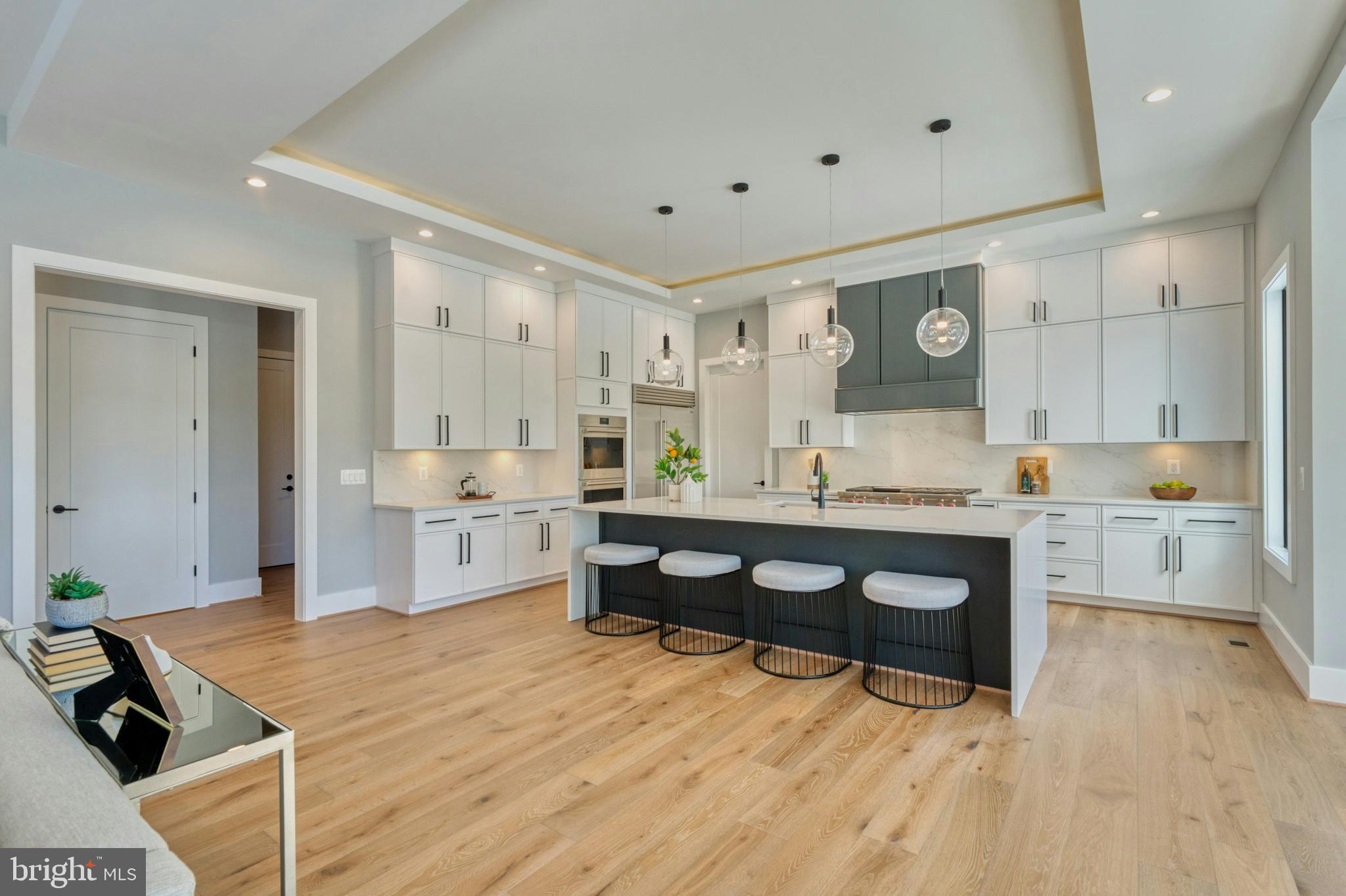 1100 Balls Hill Road McLean, VA 22101 - Photo 11 of 52 a large kitchen with granite countertop a stove a sink and a refrigerator