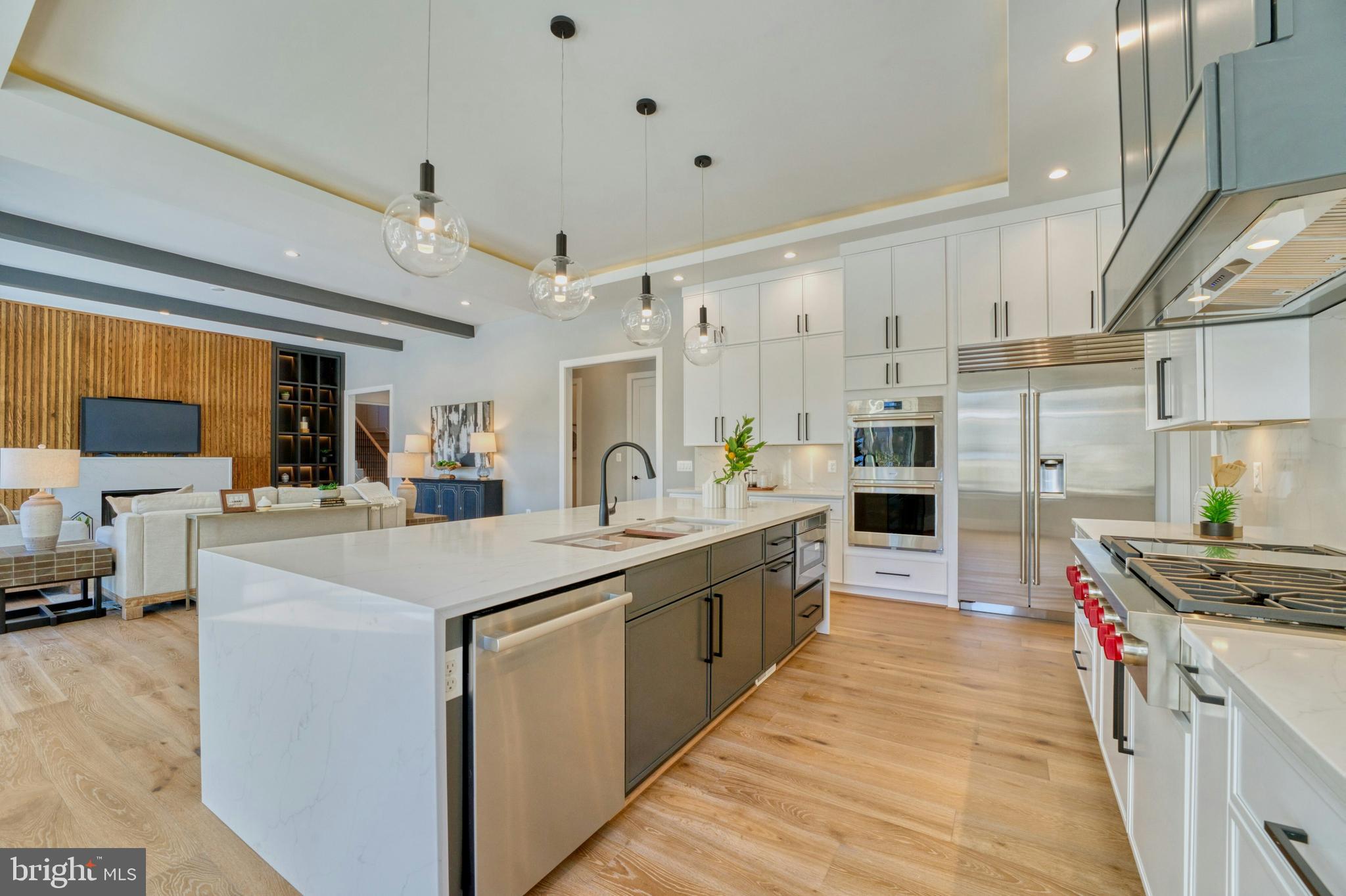 1100 Balls Hill Road McLean, VA 22101 - Photo 12 of 52 a kitchen with stainless steel appliances granite countertop a sink stove and refrigerator