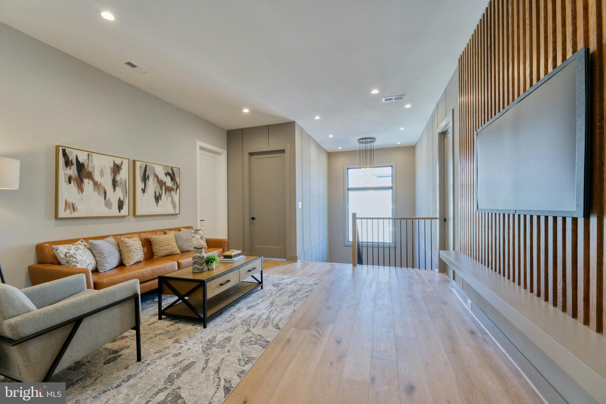 1100 Balls Hill Road McLean, VA 22101 - Photo 21 of 52 a living room with furniture and a wooden floor