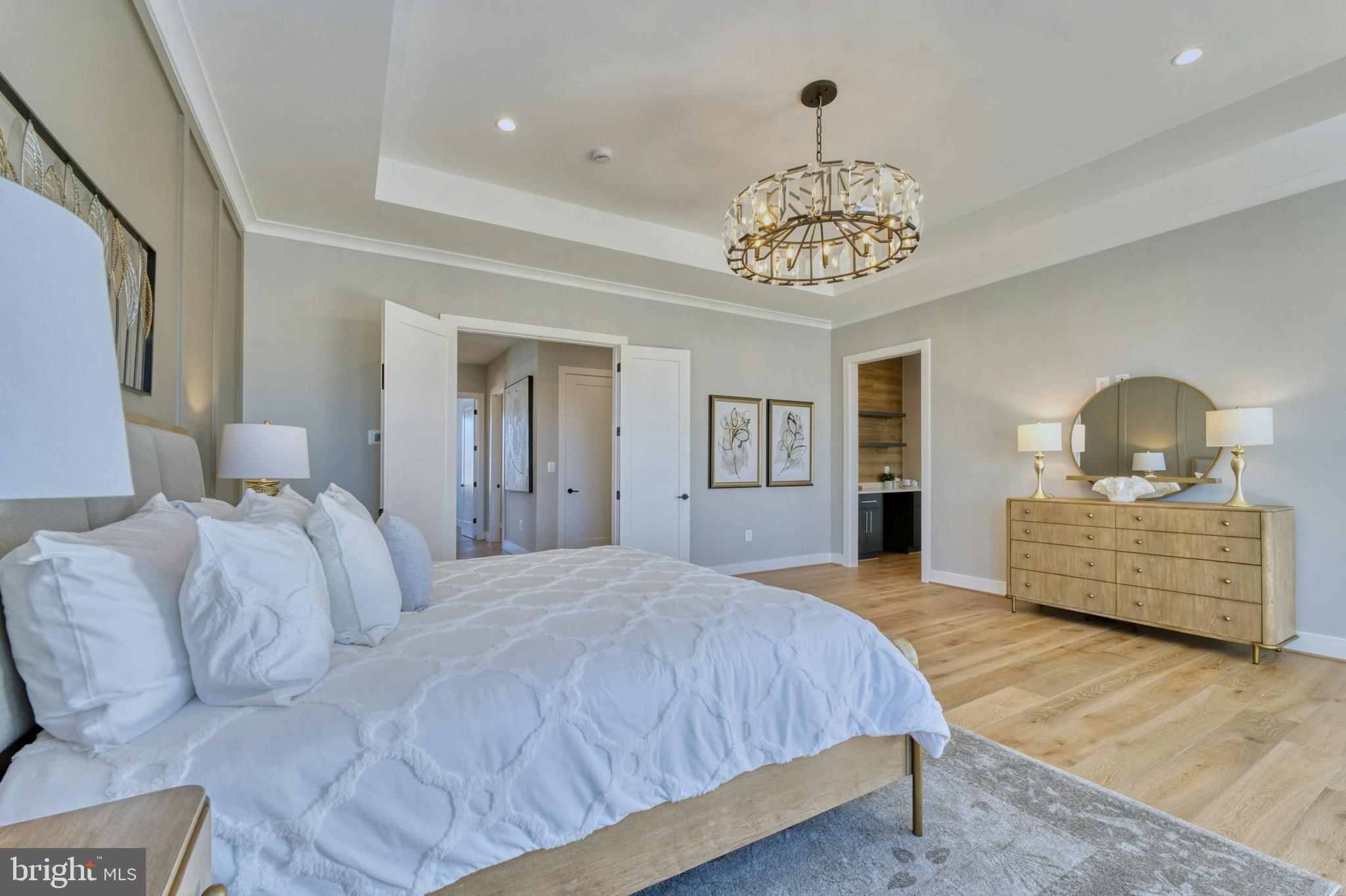 1100 Balls Hill Road McLean, VA 22101 - Photo 24 of 52 a bedroom with a bed and a chandelier