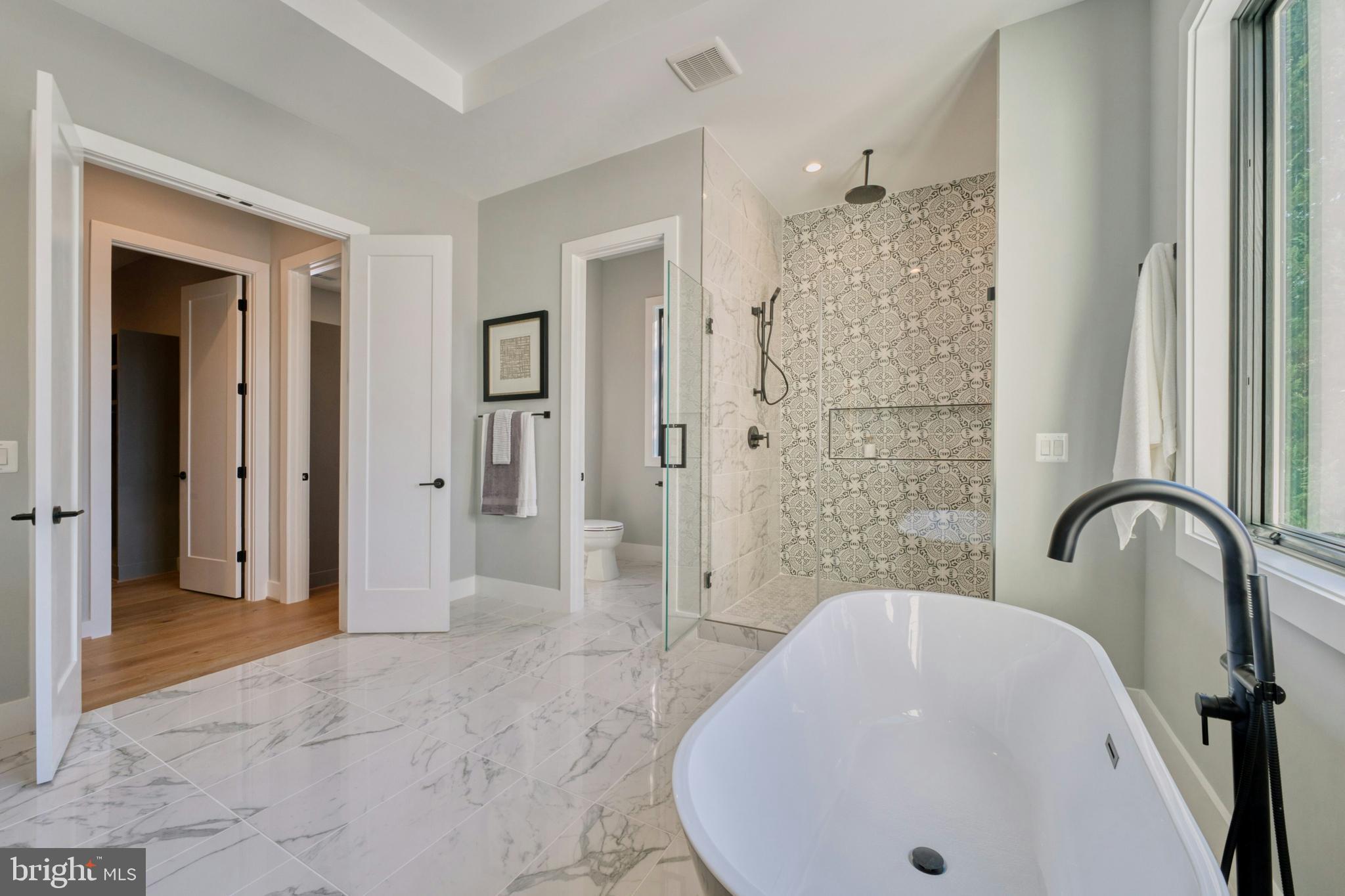 1100 Balls Hill Road McLean, VA 22101 - Photo 37 of 52 a bathroom with a sink and shower