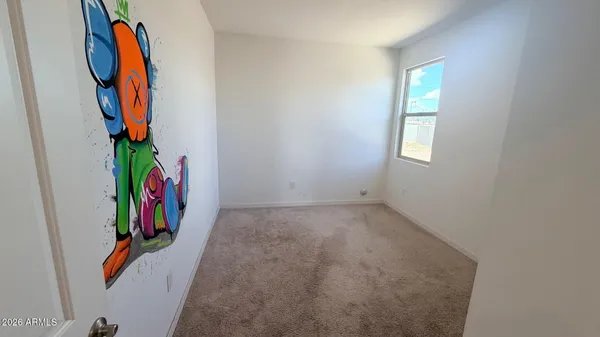 a view of a closet with storage