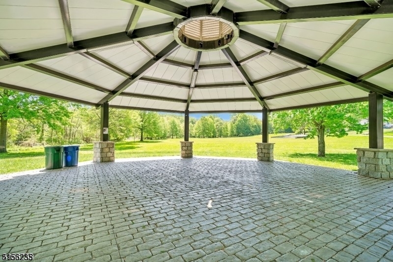 83 Springfield Avenue, Unit A Summit, NJ 07901 - Photo 14 of 14 a view of a swimming pool with a yard