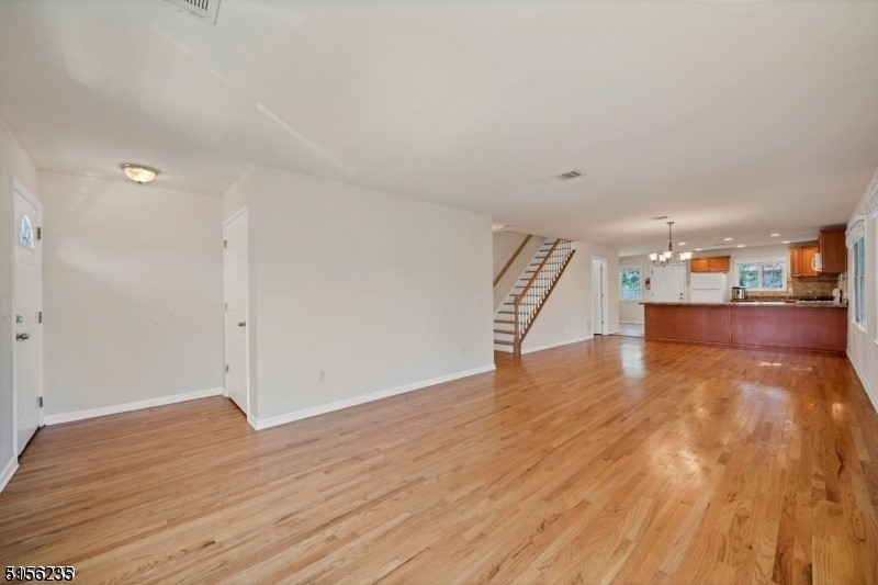 83 Springfield Avenue, Unit A Summit, NJ 07901 - Photo 2 of 14 a view of empty room with wooden floor