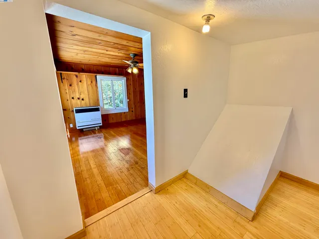 a view of a room with an empty space