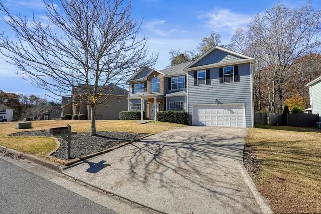 a front view of a house with entertaining space