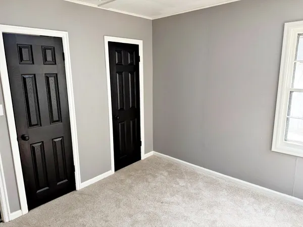 an empty room with windows