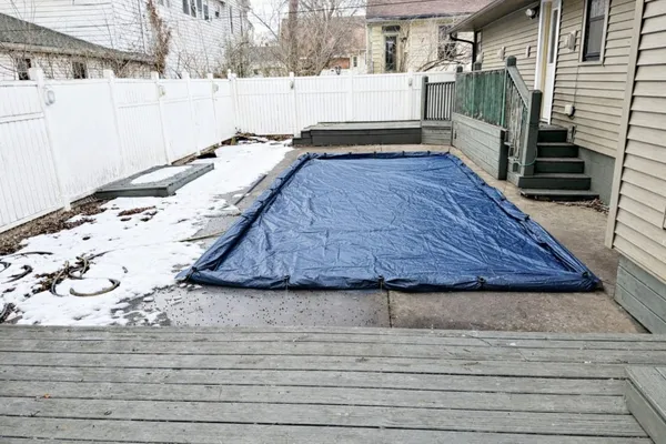 a view of a backyard of the house