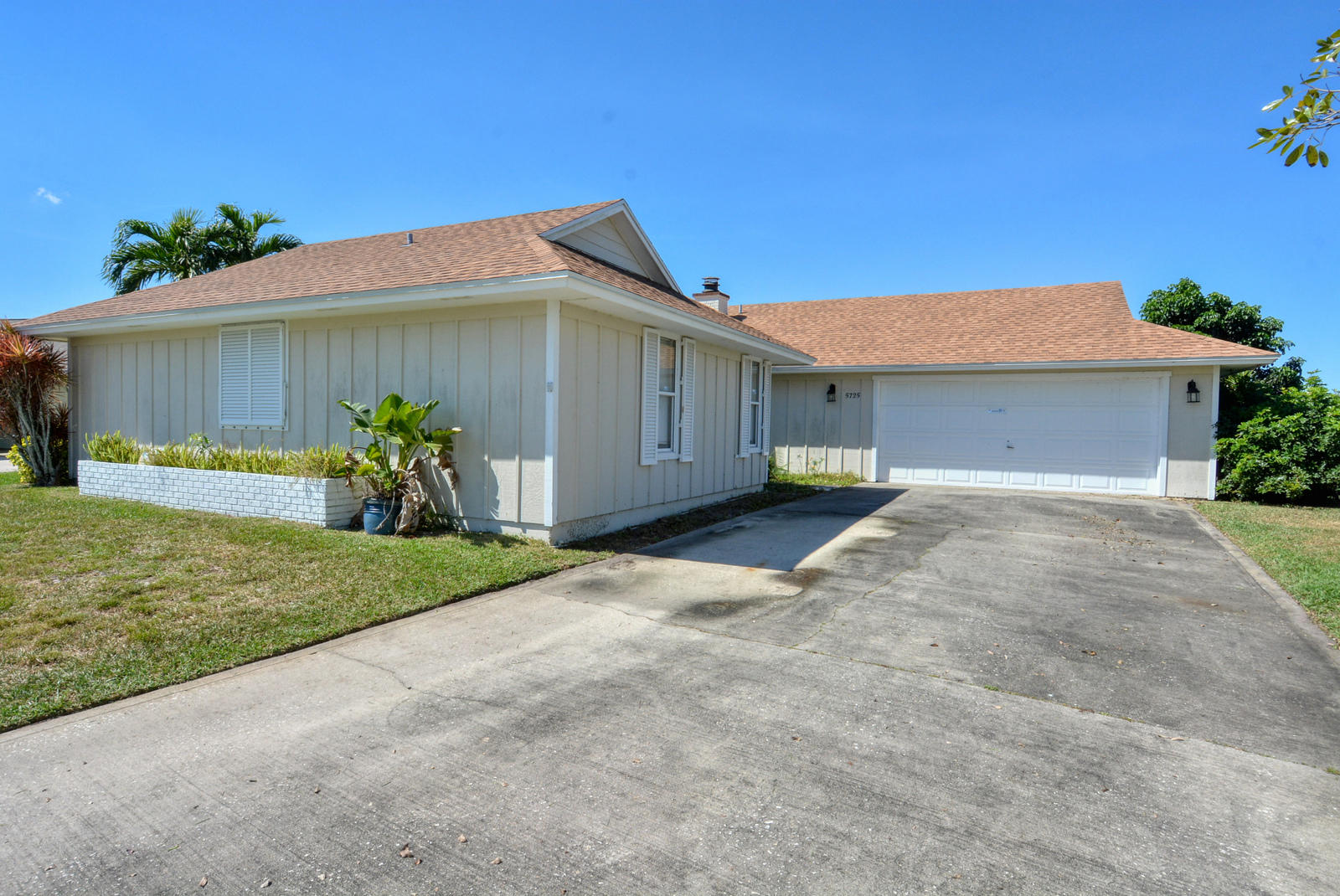 5725 Southeast Miles Grant Road Stuart, FL 34997 - Photo 1 of 46 Front