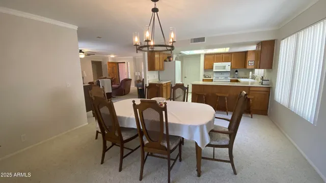 a view of a dining room with furniture