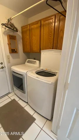 a view of a storage & utility room with a sink