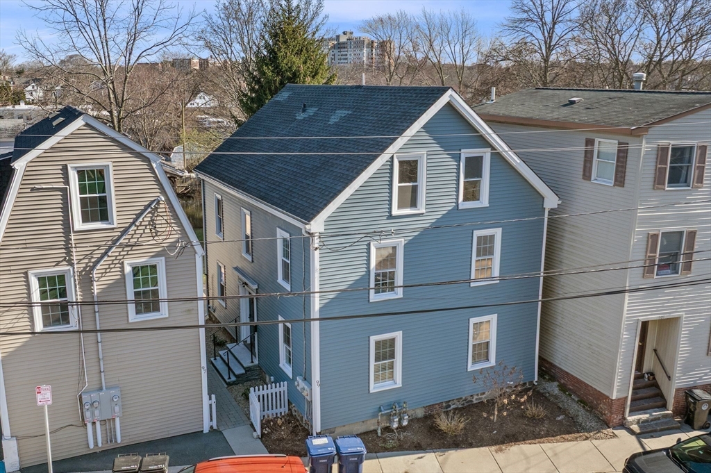 99 Mason Street, Unit 2 Salem, MA 01970 - Photo 25 of 25 a front view of a house with a yard