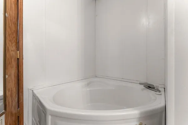 a bedroom with bunk bed and a desk