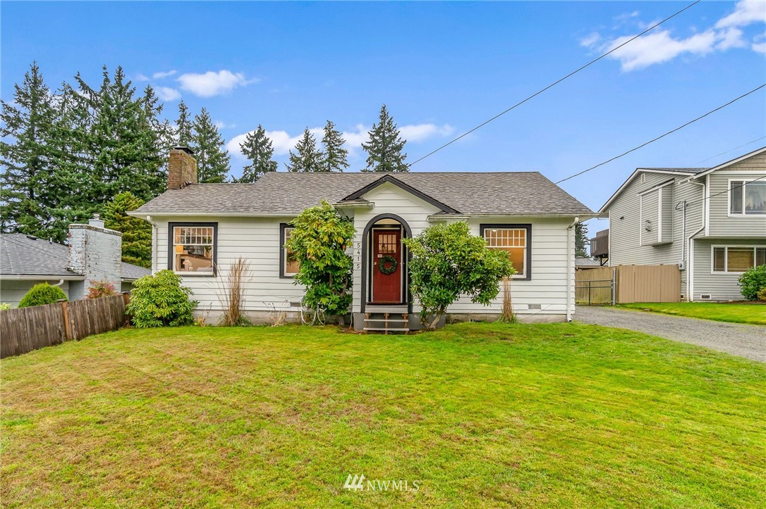 5415 Rockefeller Avenue Everett, WA 98203 - Photo 1 of 30 a front view of a house with a garden