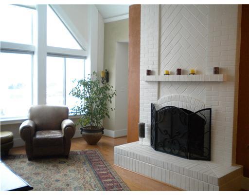 10 Ridgemead Fields Drive Plum, PA 15147 - Photo 5 of 18 Living Room. Floor to ceiling brick fireplace with gas logs and 10 ceilings. Crown moldings, recessed lights, hardwood floors, and vaulted peak at A-frame window are just a few of the outstanding features of this home.