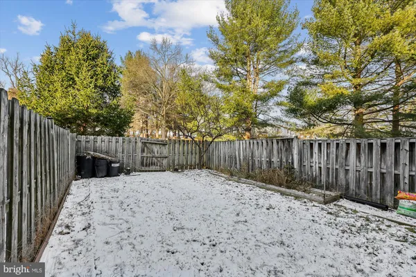 a view of swimming pool with seating space