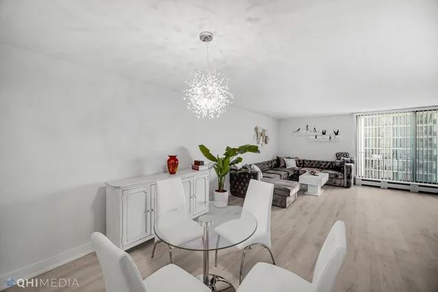 a view of a balcony with wooden floor